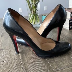 Christian Louboutin almond toe black pumps. Good condition. Reinforced sole.